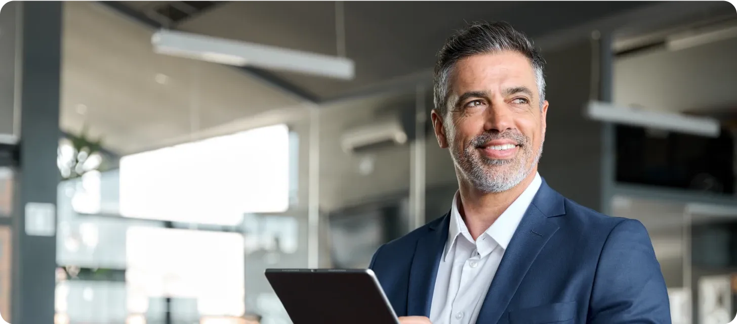 For Employers — a professional smiling in an office