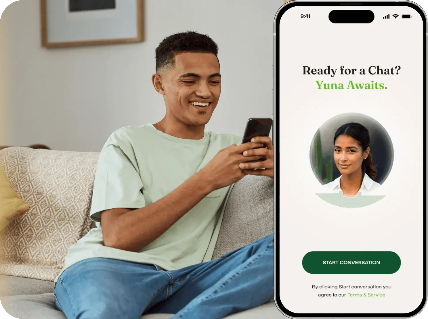 A man on a sofa smiles at his phone, beside a phone screen showing Yuna's start-conversation prompt