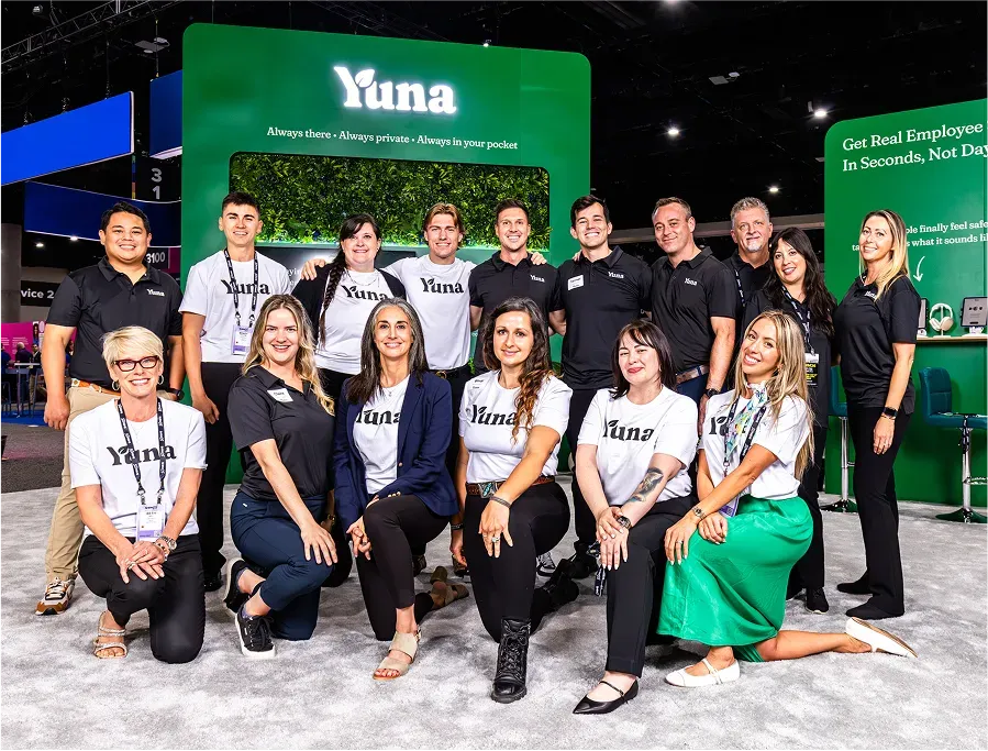 Yuna team with attendees at the SHRM 2025 booth