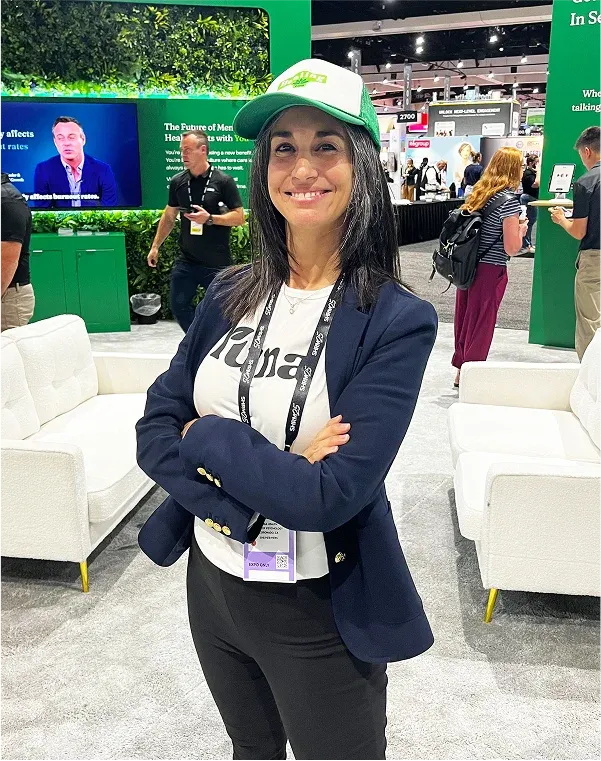 Yuna team member at the event booth